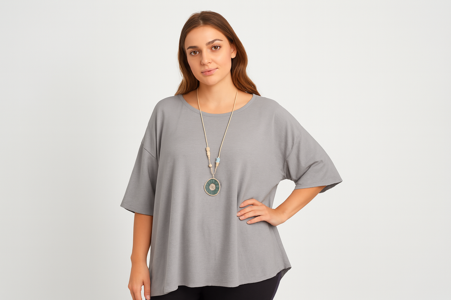 Standing pose with clean seamless sweatshirt and decorative necklace